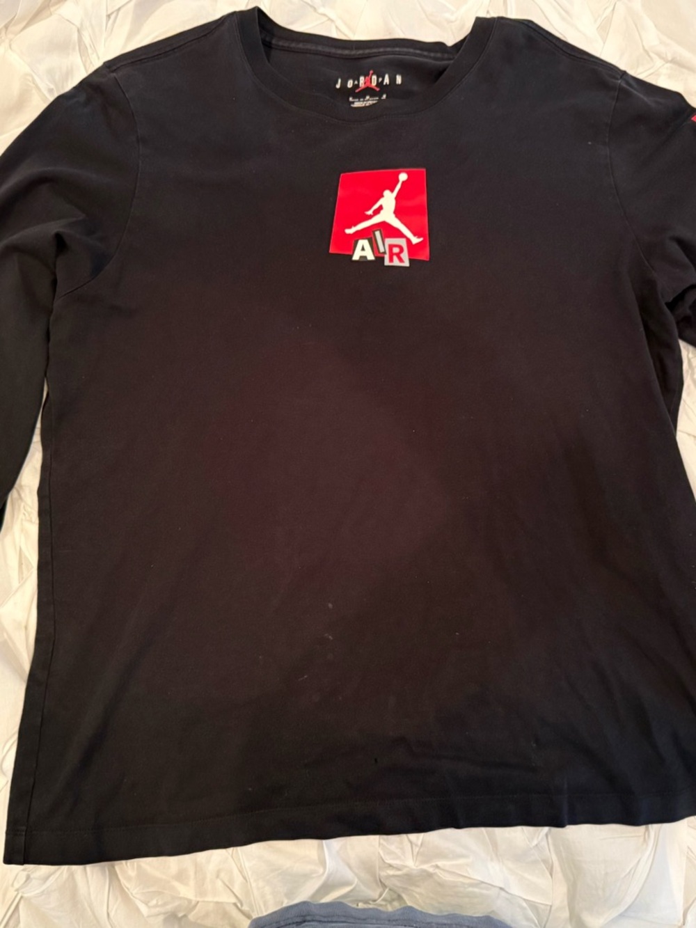 Jordan Black Long Sleeve Tee with Red and White Jumpman Graphic